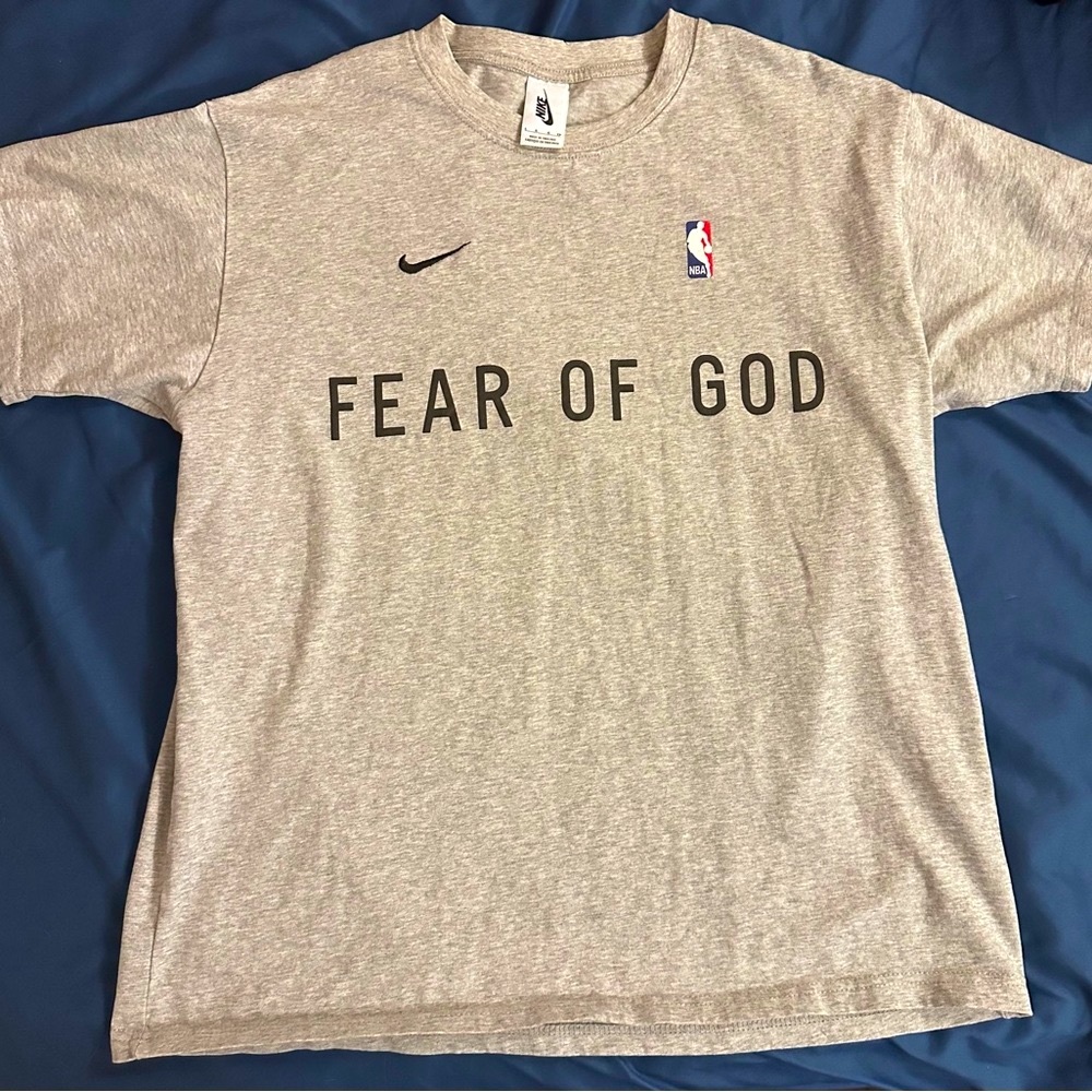 Fear of God X Nike warm-up T-shirt size large